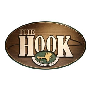 A wooden sign that says the hook